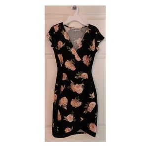 Bodycon, black floral wrap dress. Almost famous.